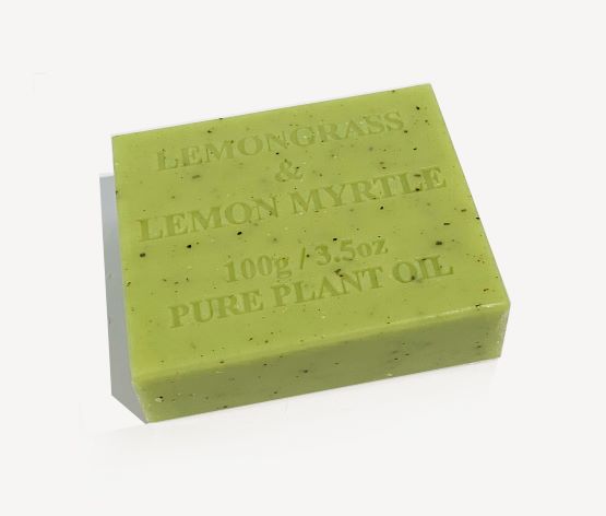 A green bar of Hustle and Co Soap - Fuck This Shit by Blue Dog Posters embossed with text that reads "LEMONGRASS & LEMON MYRTLE 100g / 3.5oz PURE PLANT OIL". Made with natural extracts, the soap has a smooth texture with small dark specks throughout, ideal for sensitive skin.