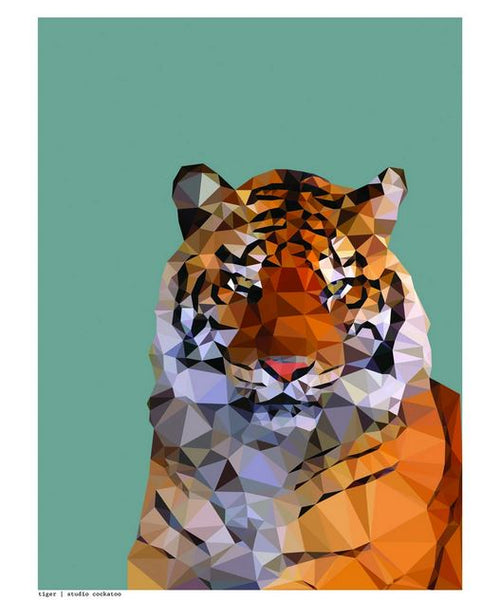 A geometric, low-poly style illustration of a tiger, with angular shapes and vibrant shades of orange, brown, white, and black. The background is a solid light green color. Part of the fap Studio Cockatoo Featured Artists Collection, Tiger by Studio Cockatoo gives the tiger a fragmented but visually striking appearance.