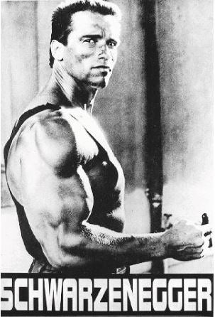 Black and white image of a muscular man standing sideways, looking toward the camera, with "SCHWARZENEGGER" written in bold letters at the bottom. He is in a sleeveless shirt, showcasing his well-defined biceps and physique. This Arnold Schwarzenegger poster by IMP 026 is printed on premium 150gsm gloss paper.