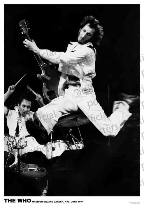 Black and white photo of a rock band performing live at Madison Square Garden, NYC in June 1974. The guitarist is captured mid-air, leaping dramatically, while the drummer plays energetically in the background. This The Who - Madison Square Garden by MUS 204 can be an excellent addition to your Music Collection, printed on premium 150gsm gloss paper. Caption reads "THE WHO.