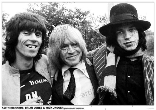 A black-and-white photo captures three men standing closely together, smiling. The man on the left is wearing a jacket, the middle man is in a suit, and the man on the right is adorned with a striped scarf and a hat. Text at the bottom identifies them as Keith Richards, Brian Jones, and Mick Jagger - an ideal addition to your music collection. This iconic image is featured in "Rolling Stones London 1968" by MUS 104.
