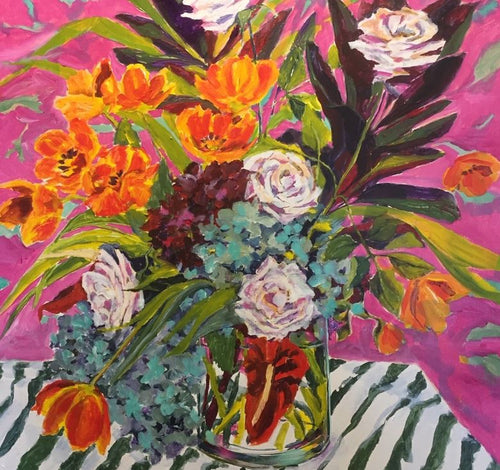 Celebration by Christine Read, available from Blue Dog Posters, features a vibrant painting of a flower bouquet in a glass vase. The arrangement showcases orange and yellow flowers alongside white roses, green leaves, and blue blooms, all set against a bright pink background. This captivating art print is brought to life on matte art paper, with the vase elegantly resting on a striped black and white surface.