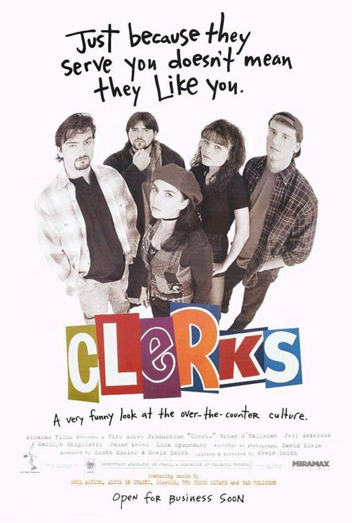 Cult movie poster for "Clerks" featuring five casually dressed individuals standing together. Handwritten-style text at the top states, "Just because they serve you doesn't mean they like you." The title "Clerks" is displayed in colorful, block letters below them. Printed on premium 150gsm gloss paper by IMP 101.