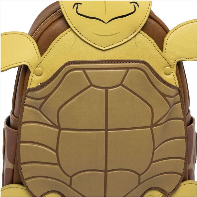 Close-up of the Finding Nemo Crush Mini Backpack by Blue Dog Posters. This faux leather children's backpack is designed to resemble Crush, featuring a yellow and brown turtle shell with flippers and a smiling face. Detailed stitching outlines the segments, adding personality to this charming Crush cosplay backpack.