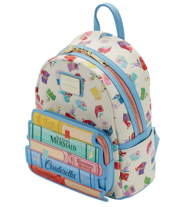 The Disney Princess Books Mini Backpack by Blue Dog Posters features designs inspired by classic tales of Disney princesses, including Ariel from "The Little Mermaid," Aurora from "Sleeping Beauty," and Cinderella. The backpack includes a main compartment, a front pocket resembling books, and blue accents.