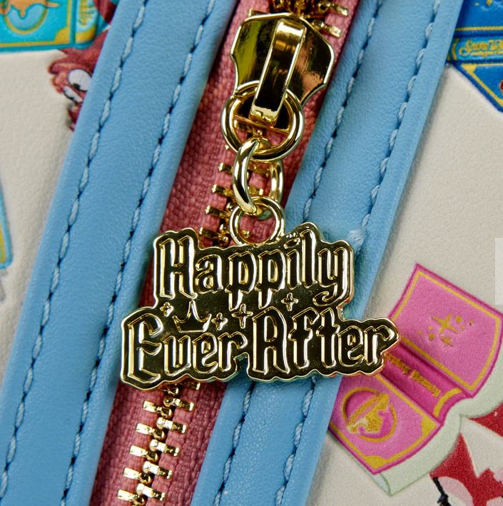 Close-up of a zipper with a metallic pull featuring the words "Happily Ever After." The zipper is surrounded by blue and pink fabric, and there are colorful, detailed illustrations on the background fabric. This Blue Dog Posters officially licensed Disney Princess Books Mini Backpack captures the magic of Disney Princess Books perfectly.