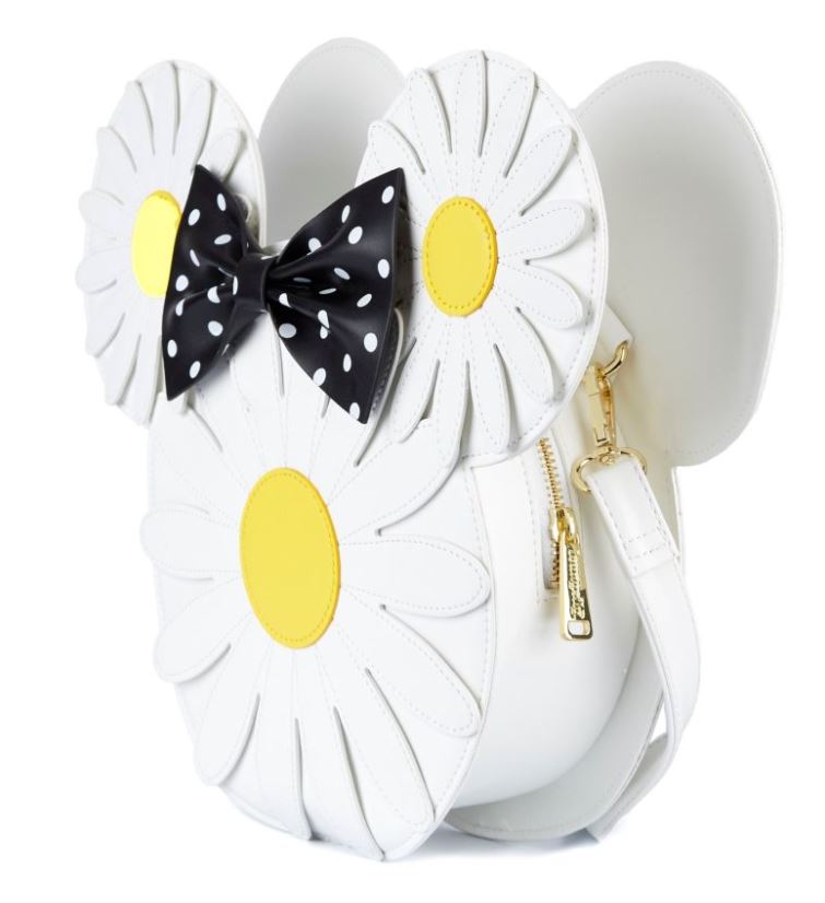 The officially licensed Disney Minnie Mouse Daisies Crossbody Bag by Blue Dog Posters is a charming white handbag designed to look like a mouse head with large, daisy-shaped ears and a daisy face, complete with yellow centers. Made from vegan leather, it features a black and white polka dot bow, a zipper compartment, and a white shoulder strap.