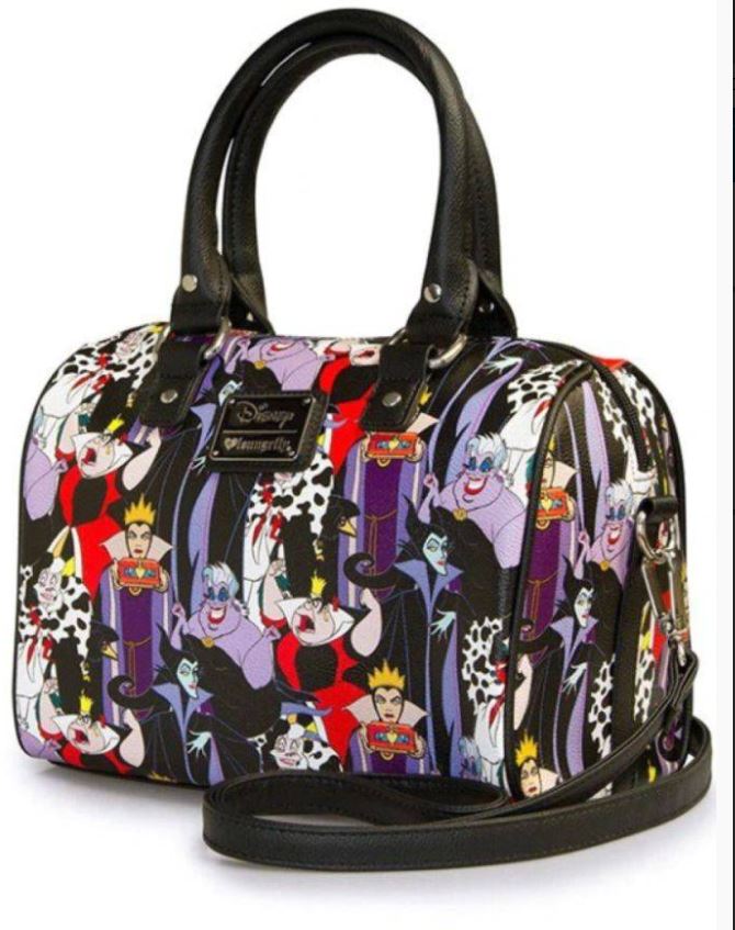 The Disney Villains Mini Duffle Crossbody by Blue Dog Posters showcases colorful designs featuring Disney Villain characters such as Ursula, Cruella de Vil, Maleficent, and the Evil Queen. The black handles and shoulder strap provide a striking contrast to the vibrant cartoon artwork on the vegan leather body.