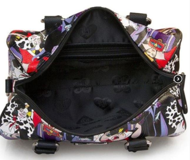 The Disney Villains Mini Duffle Crossbody by Blue Dog Posters features a wide open top revealing a spacious black interior with a zippered pocket. Its colorful exterior is decorated with playful cartoon characters of Disney Villains in various poses. The bag includes short black handles and is lined with subtle patterned fabric.