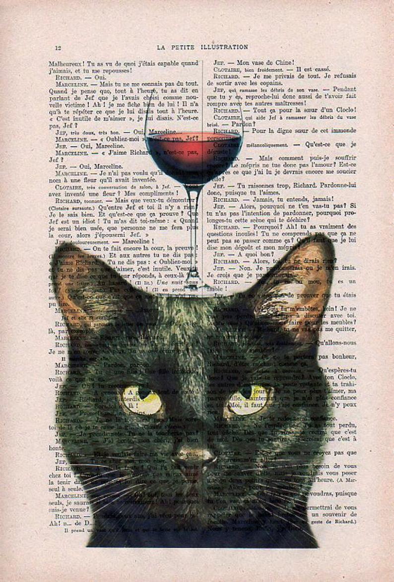 The ABP Antique Book Print 15 x 21cm Cat Wine features a unique design with a black cat's head superimposed on an old page from antique French books. Above the cat's head, a silhouette of a glass of red wine aligns with its ears, creating the illusion that the glass is part of the cat's head. This gorgeous print offers a captivating blend of whimsy and elegance.