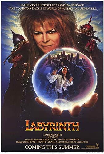 Poster for the cult movie "Labyrinth" featuring a man with spiky hair holding a crystal orb with a woman inside it. Various creatures surround them with a mystical city background. Text reads: "Jim Henson, George Lucas, and David Bowie take you into a dazzling world of fantasy and adventure. LABYRINTH. A Jim Henson Film. Coming This Summer." Available as an extra product named Labyrinth by IMP 016.
