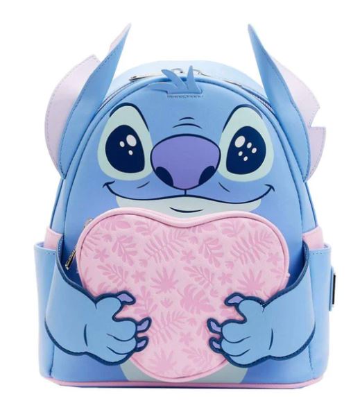 Introducing the Lilo & Stitch Heart Stitch Mini Backpack by Blue Dog Posters. Crafted from vegan leather, this mini backpack is designed to resemble the beloved character Stitch from Disney's "Lilo & Stitch." In blue and light purple hues, it features a front pouch with a pink heart adorned with floral patterns, along with Stitch's facial features, ears, and hands holding the heart.