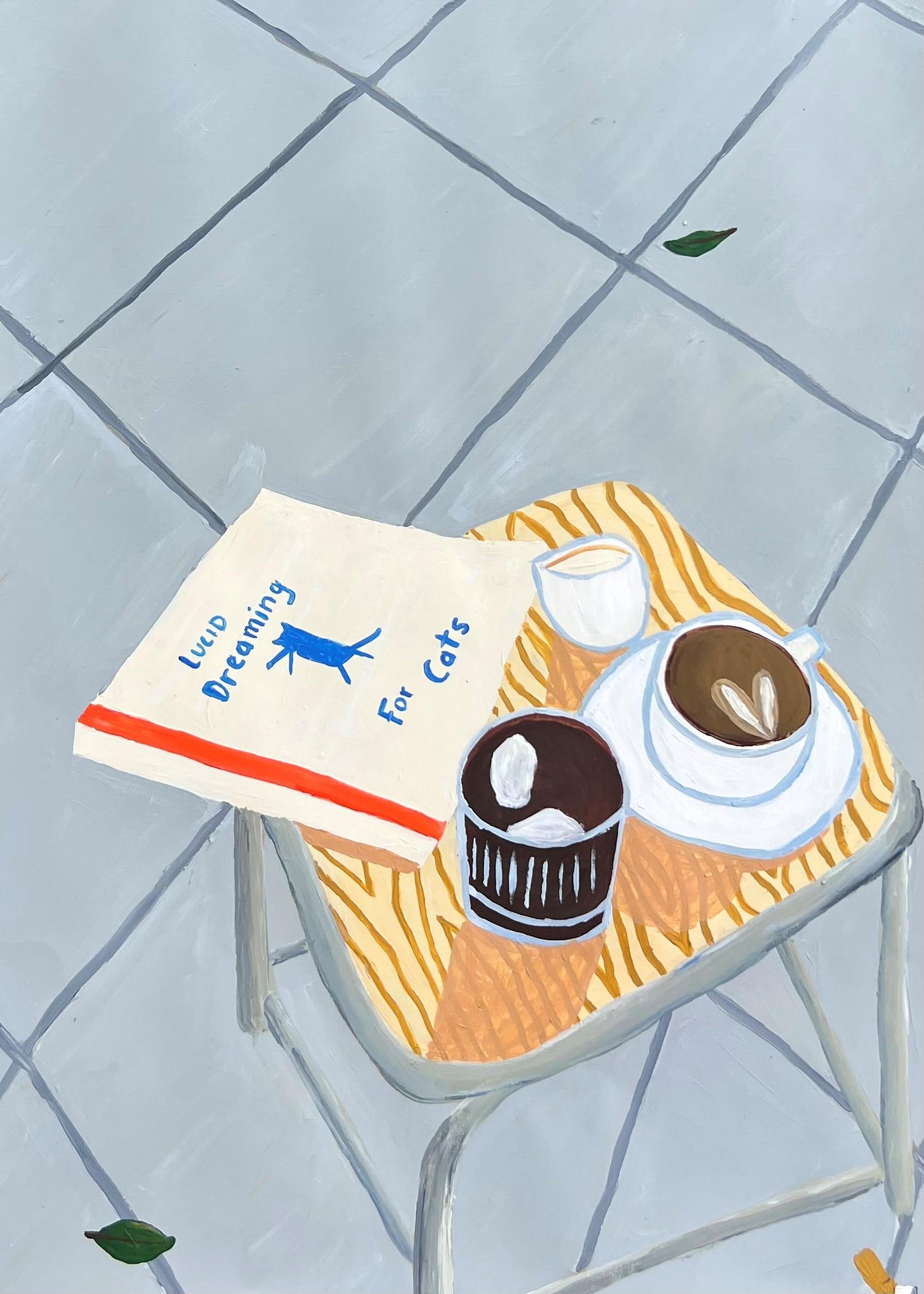 A small table with the "Lucid Dreaming for Cats Vanessa Franklin" art print by Blue Dog Posters, a cup of coffee, dessert, and teacup sits on tiled flooring with leaves—part of a featured artist collection.