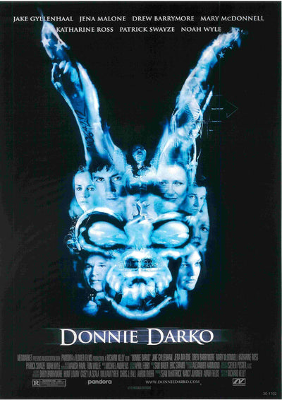 Here's a revised version of the sentence using the given product data:

A Blue Dog Posters design for "Donnie Darko" showcases a prominent rabbit head made of blue smoke, with character faces subtly appearing within it. The top and bottom display the cast names and movie title.