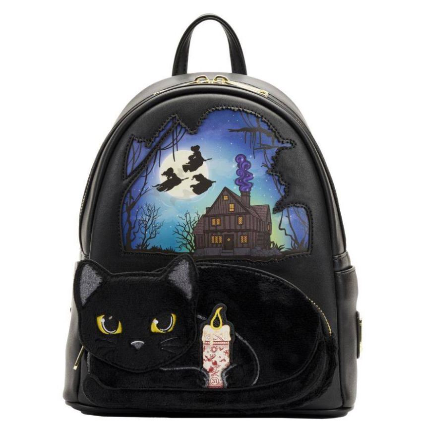 The Blue Dog Posters Hocus Pocus Binx Plush Pocket Mini Backpack showcases a black backpack adorned with Thackery Binx, the black cat from Hocus Pocus, holding a lit candle at the bottom. Above him lies a spooky house with a glowing window, surrounded by dark trees and flying birds against a night sky. The backpack also features gold zippers and a convenient handle on top.