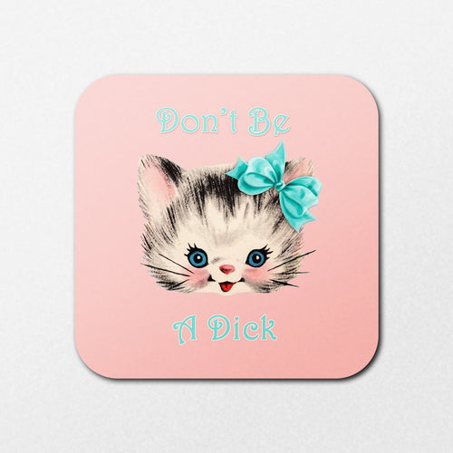The Don't Be a Dick Coaster by Blue Dog Posters features a cute kitten with a blue bow, smiling on a pink background with the text "Don't Be A Dick" above and below.