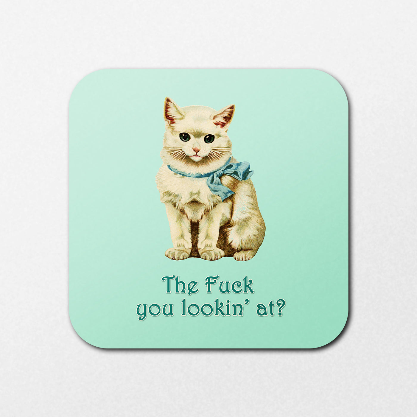 A vintage-style coaster by Blue Dog Posters features a cat with a blue ribbon on a light green background, captioned "The f*ck you lookin' at?" This is the 'Cat The Fuck You Lookin At Coaster.'.