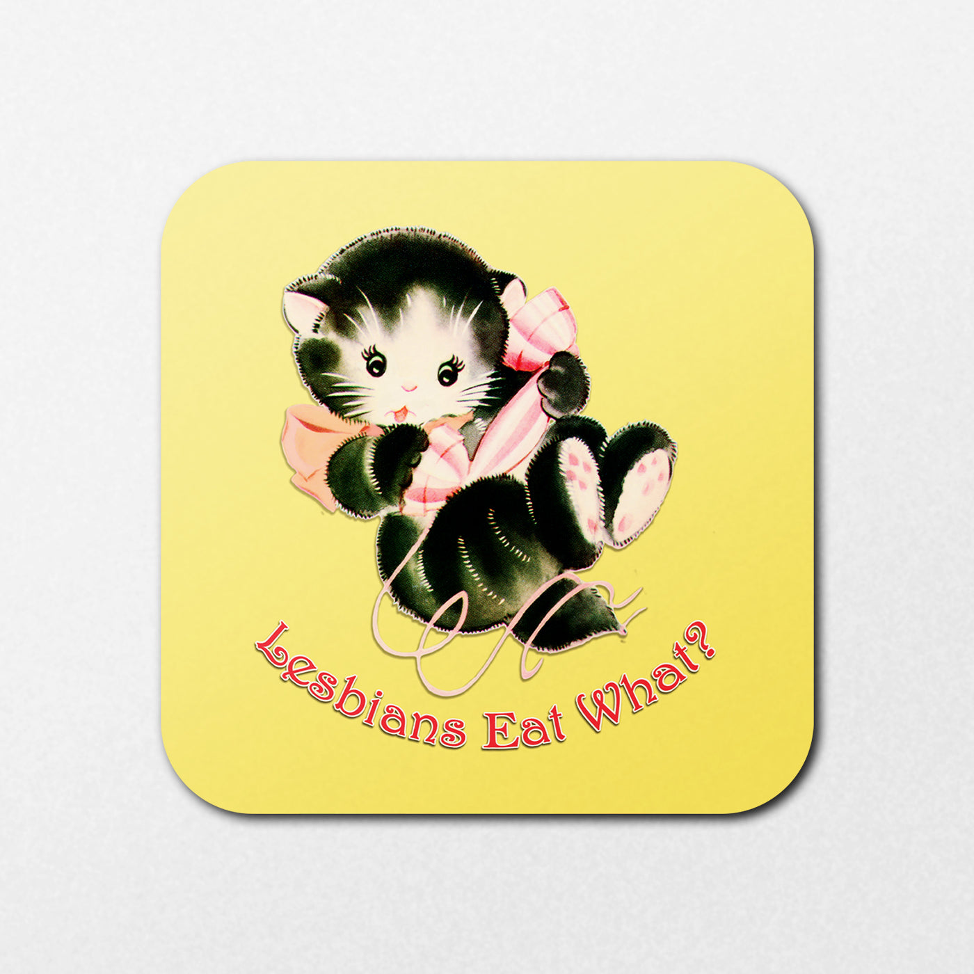 The "Lesbians Eat What" coaster by Blue Dog Posters features a cute black and white kitten with a pink bow, set against a yellow background with vibrant text.
