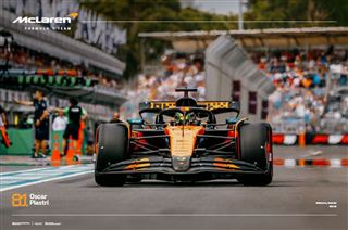 The SPO 046 "F1 - Piastri Melbourne" poster features Oscar Piastri’s McLaren racing at speed, captured on premium gloss paper—perfect for any sports collection with its vivid orange and black livery and dynamic racetrack scene.