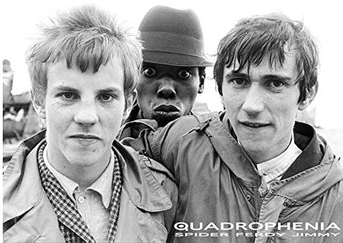 Three young men pose together; two smile at the camera while the center one looks surprised. "The Who - Quaddrophenia" and "MUS 011" appear in the bottom right—an iconic rock poster for any music fan’s collection.