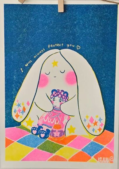 A charming A4 riso print by Misu Juju for Blue Dog Posters, featuring a large bunny with starry ears hugging a doll figure under glowing "I will always protect you" text above a colorful checkered floor.