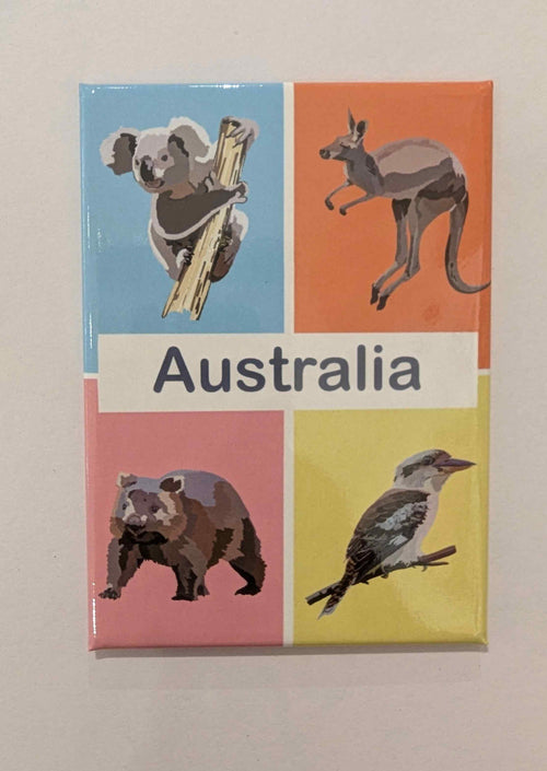 Brighten your fridge with the Travel Magnet - Australia Animals by Blue Dog Posters, featuring a koala, kangaroo, wombat, and kookaburra in four sections with "Australia" at the center—a perfect travel souvenir.