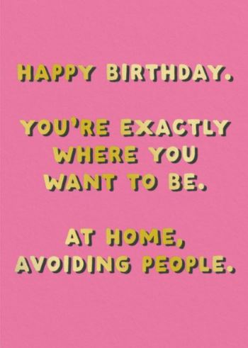 The Avoiding People Greeting Card by Blue Dog Posters features bold yellow and white text on pink: "HAPPY BIRTHDAY. YOU'RE EXACTLY WHERE YOU WANT TO BE. AT HOME, AVOIDING PEOPLE." FSC certified, plastic free packaging.
