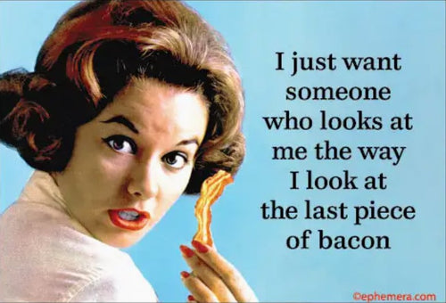 A woman with styled brown hair and red lipstick gazes wide-eyed at bacon, capturing the humor of sayings. The Someone Who Looks Like Bacon Magnet by Blue Dog Posters is perfect for adding fun to any fridge or magnetic surface.