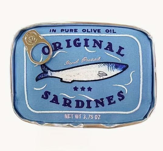 The Sardine Tin Bag Blue by Blue Dog Posters is a PU leather bag shaped like an "Original Sardines" can, featuring a fish illustration, pull-tab detail, small size, and labels reading "In Pure Olive Oil" and "Net Wt 3.75 oz.