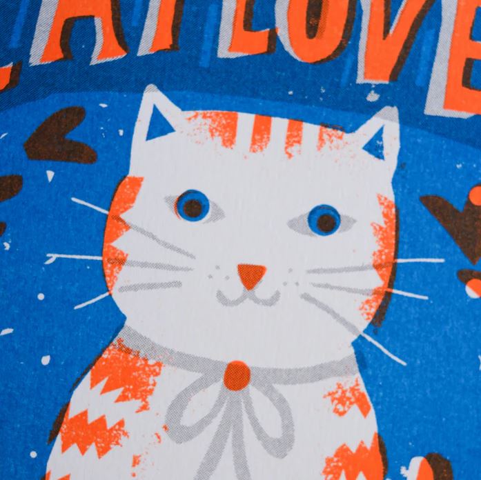 Illustration of a white and orange cat with blue eyes, bow, and hearts, with "LOVE" above on blue—perfect as an eco-friendly Cat Lover A4 Print by Printed Peanut from Blue Dog Posters for unique wall decor.