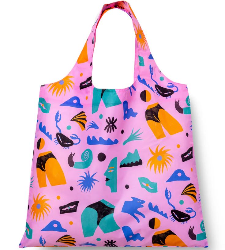 The Cheeky Art Sack by Blue Dog Posters is a machine washable tote featuring a pink background with colorful abstract shapes and playful figures in orange, teal, black, yellow, and blue.