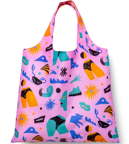The Cheeky Art Sack by Blue Dog Posters is a machine washable tote featuring a pink background with colorful abstract shapes and playful figures in orange, teal, black, yellow, and blue.