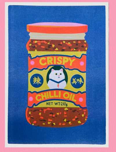 Chilli Crisp Oil Riso Print by Naomi Wilkinson Illustration for Blue Dog Posters features a white cat on a vibrant jar label with colorful designs, set against a bold blue background and pink border.