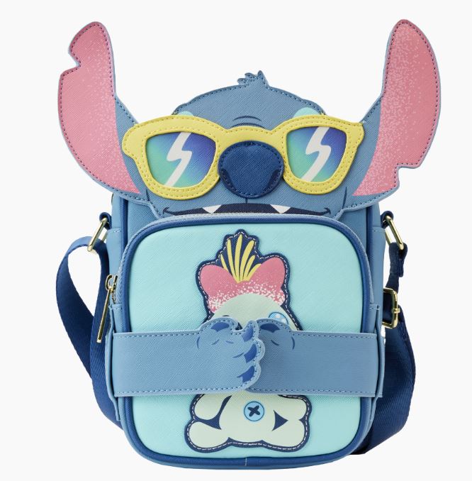 This whimsical crossbody bag, the Lilo & Stitch - Stitch Beach Crossbuddy by Blue Dog Posters, is crafted from vegan leather and inspired by Loungefly Disney designs. It resembles a cartoon character with large pink ears and lightning bolt sunglasses, featuring a playful front pocket print and an adjustable strap for added flair on any Stitch Beach Day adventure.