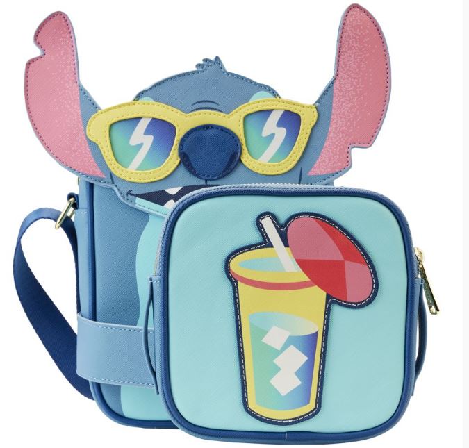 Introducing the Lilo & Stitch - Stitch Beach Crossbuddy by Blue Dog Posters: a charming blue crossbody bag featuring an adorable creature design with pink ears and yellow sunglasses. This bag also includes a smaller vegan leather pouch, decorated with a delightful illustration of a refreshing drink complete with ice cubes, straw, and a red umbrella.