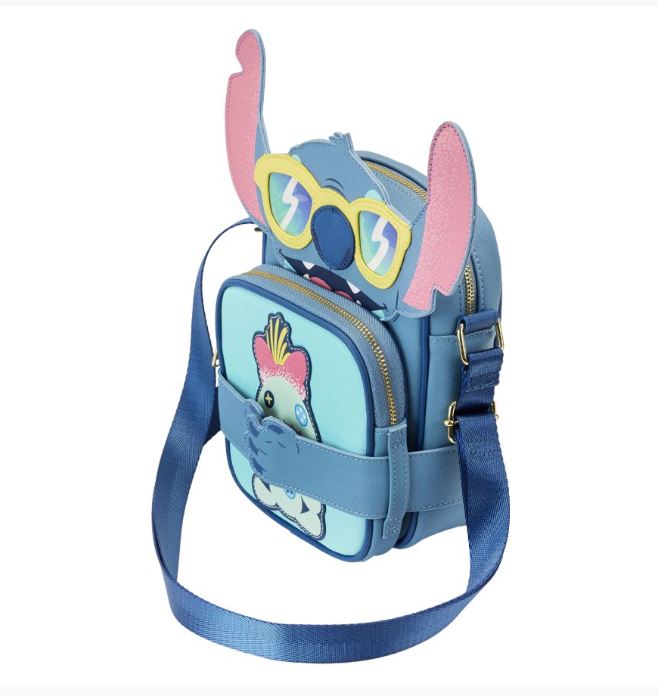 Introducing the Lilo & Stitch - Stitch Beach Crossbuddy by Blue Dog Posters, a blue crossbody crafted from vegan leather with a cartoon design inspired by an animated character with large ears and sunglasses. The front pocket features a small creature adorned with colorful feathers, complemented by a matching blue strap.