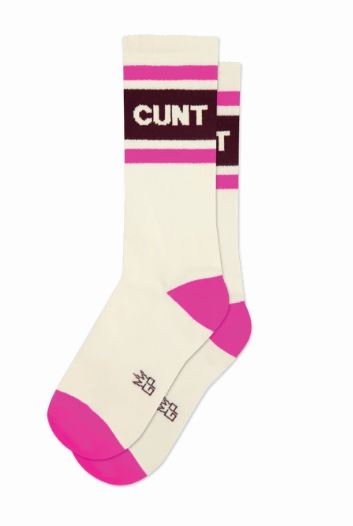 Blue Dog Posters’ Cunt Gym Crew Socks are unisex, cream gym socks with pink toes, heels, and stripes. Made of natural cotton, they display "CUNT" in a black stripe near the top.