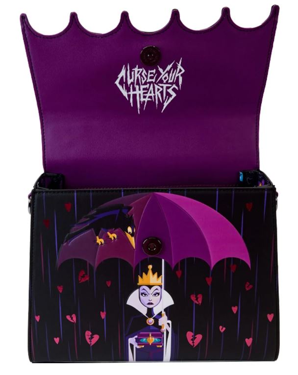 The Blue Dog Posters Disney Villains Curse Your Hearts Crossbody Bag features a crown-like scalloped top edge. Inside, it's royal purple with the phrase "Curse Your Hearts." The exterior showcases a cartoon Evil Queen holding an umbrella with bats and hearts, all set against a dark, rainy backdrop. Perfect for Disney Villains fans!