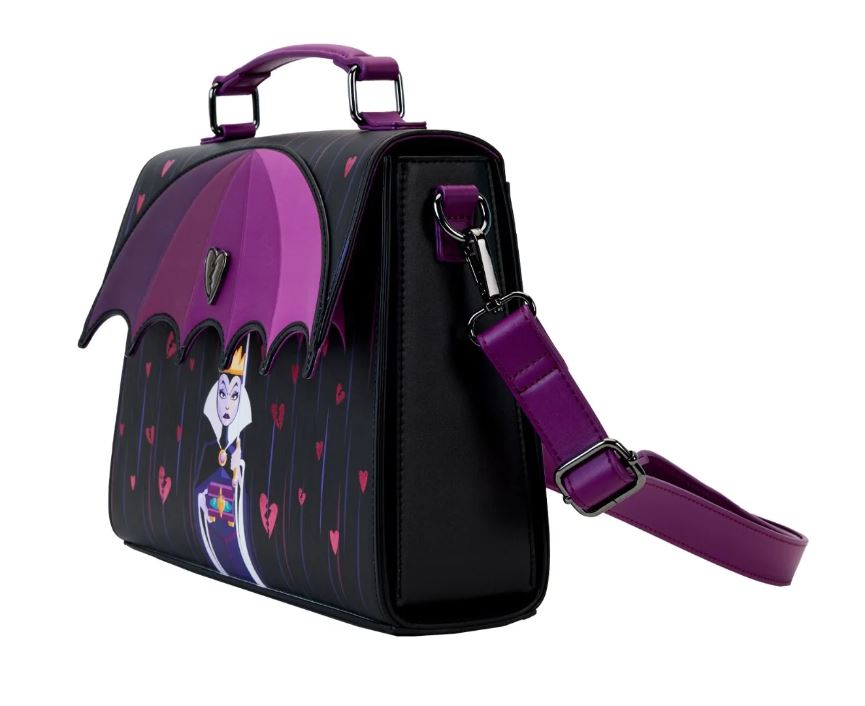 The Disney Villains Curse Your Hearts Crossbody by Blue Dog Posters is a stylish black bag adorned with a purple umbrella design and an illustration of the Evil Queen holding a heart box. It features a purple handle, matching adjustable shoulder strap, and small heart details on the sides.