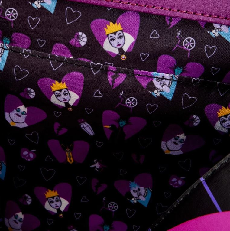 Close-up of fabric from the Disney Villains Curse Your Hearts Crossbody by Blue Dog Posters featuring a repeating pattern of an illustrated villainous character wearing a crown and purple cloak in various poses. The black background is adorned with small hearts, skulls, and magic wands, perfect for this enchanting bag.
