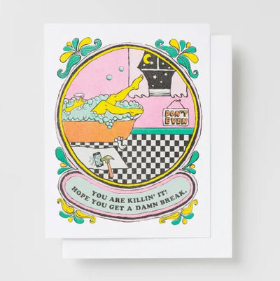 The "Hope You Get a Damn Break Risograph Card" by Blue Dog Posters features a vibrant, veggie-based ink print of someone unwinding in a bubble bath with a yellow rubber duck and a nighttime sky visible through the window. The card displays the words "DON'T EVEN" on the wall and "YOU ARE KILLIN' IT! HOPE YOU GET A DAMN BREAK" on a banner below.