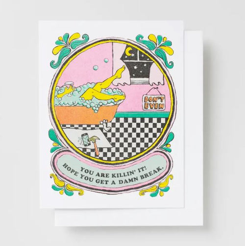 The "Hope You Get a Damn Break Risograph Card" by Blue Dog Posters features a vibrant, veggie-based ink print of someone unwinding in a bubble bath with a yellow rubber duck and a nighttime sky visible through the window. The card displays the words "DON'T EVEN" on the wall and "YOU ARE KILLIN' IT! HOPE YOU GET A DAMN BREAK" on a banner below.