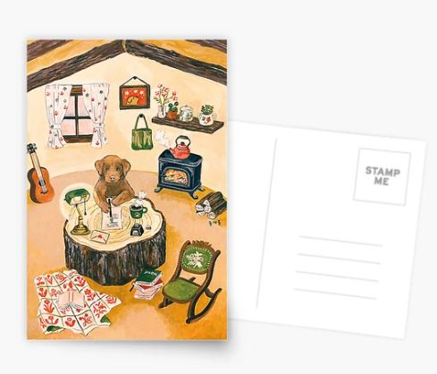 The Dear My Friend - Mosla Postcard by Blue Dog Posters features a cozy room with a bear at a wooden table, books, and tea—perfect for your colorful stationery collection. Back is blank for address and stamp.