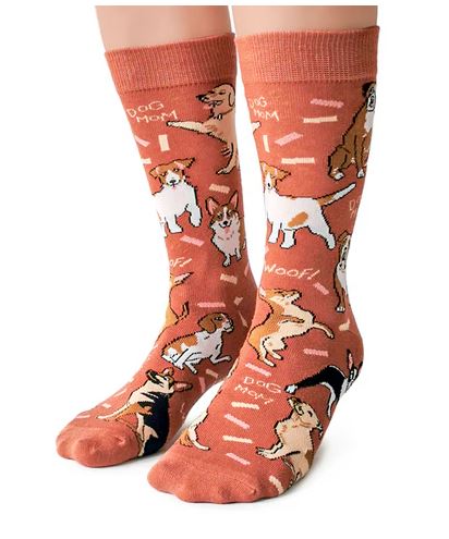 A pair of orange Blue Dog Posters Dog Ma Socks for women, featuring cartoon dogs, bones, and the phrases "DOG MOM" and "WOOF"—a fun novelty gift for any dog lover.