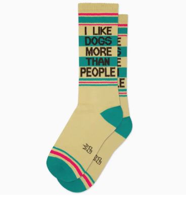 Blue Dog Posters’ "I Like Dogs More Than People Gym Crew Socks" feature beige fabric, teal heel/toe, pink-green stripes, and bold text—making them the perfect gift for any dog lover who prefers pups over people.