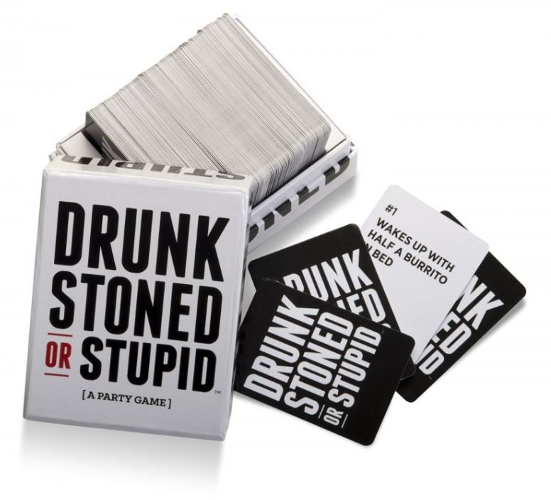 An open box of the card game "Drunk Stoned or Stupid" by Blue Dog Posters reveals a stack of prompt cards inside and a few scattered outside. One visible card reads "#1 Wakes up with half a burrito in bed." Perfect for your next party, its white background sets the stage for endless laughter.