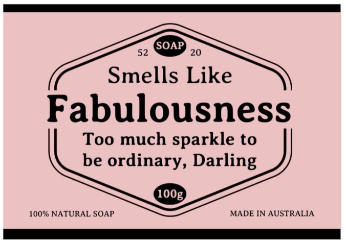 The pink label on Blue Dog Posters’ Hustle and Co Soap - Fabulousness reads: “Smells Like Fabulousness. Too much sparkle to be ordinary, Darling.” Also: “100% natural soap,” “100g,” “52 SOAP 20,” “Made in Australia.”.