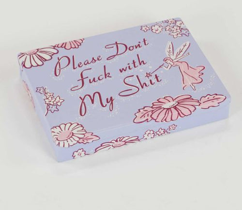 The "Don't Fuck With My Shit Small Tin" by Blue Dog Posters features a pastel purple design with pink flowers and a fairy—a sassy, novelty gift for anyone who loves bold style.