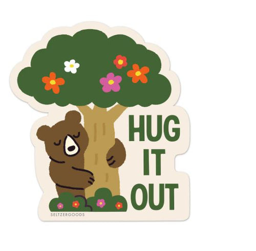 The Hug it Out Bear Vinyl Single Sticker by Blue Dog Posters shows a cute cartoon bear hugging a flower-filled tree with bold green "HUG IT OUT" text. This playful, friendly sticker has a matte finish and is water resistant.