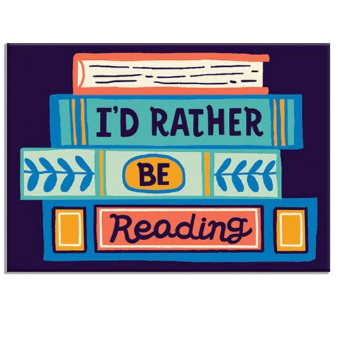 The Blue Dog Posters "I'd Rather be Reading" Rectangle Magnet features a vibrant stack of books with bold, playful lettering on a dark background.